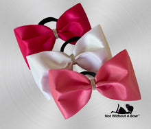 Load image into Gallery viewer, Pink Awareness Satin Tailess Cheer Bow 4" XL with Rhinestone Center

